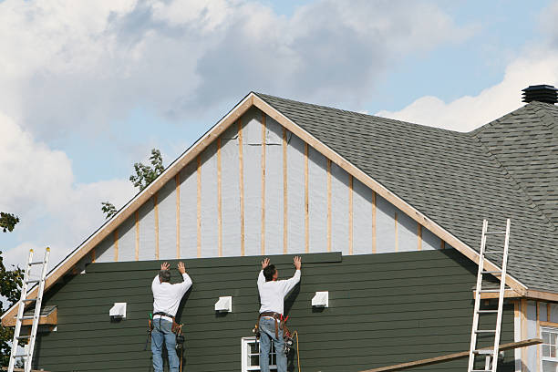 Professional Siding Repair technician working in Winchester, OH